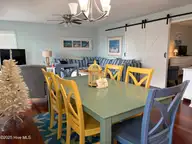8801 Reed Drive 105 N, Emerald Isle, NC 28594 — 1-bedroom waterfront condo in Sound Of The Sea, Emerald Isle, NC, photo 8 of 37: Dining area