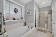 2037 Fanning Court, Leland, NC 28451 — 4-bedroom home in Waterford of the Carolinas, Leland, NC, photo 20 of 64: Primary Bathroom