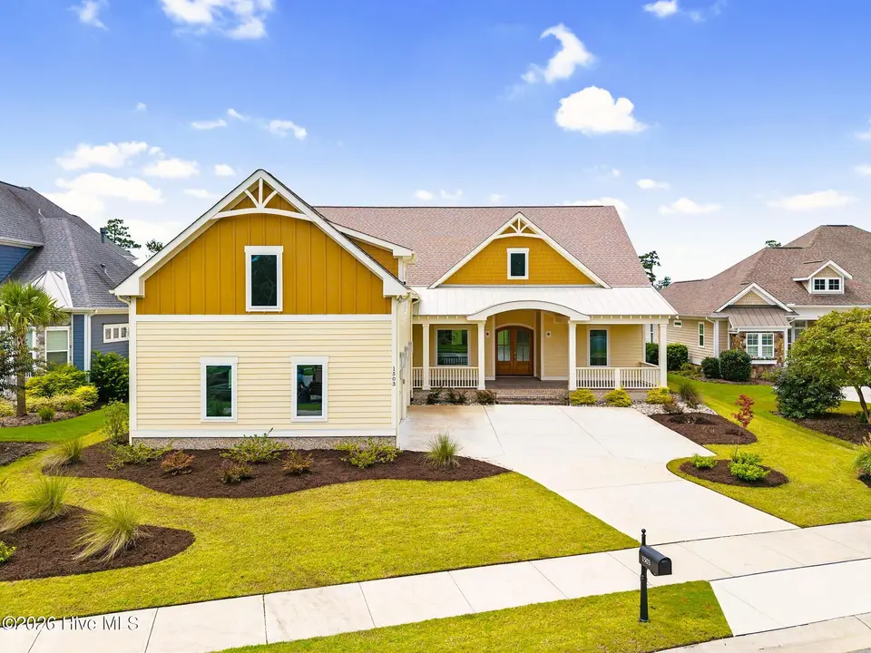 1503 Cape Fear National Drive, Leland, NC 28451 — 4-bedroom waterfront home in Brunswick Forest, Leland, NC, photo 1 of 1: front elevation
