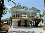 5605 E Yacht Drive, Oak Island, NC 28465 — 4-bedroom home, Oak Island, NC, photo 1 of 9
