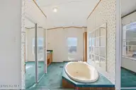 2186 Forest Drive SW, Supply, NC 28462 — 2-bedroom manufactured home in Forest Hills, Supply, NC, photo 15 of 26: master bath 1a
