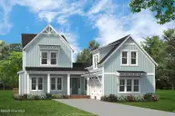115 S Middleton Drive NW, Calabash, NC 28467 — 4-bedroom waterfront home in Brunswick Plantation, Calabash, NC, photo 1 of 38: Emmy Exterior