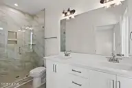 126 Shell Road, Surf City, NC 28445 — 3-bedroom waterfront townhome in Dune Ridge, Surf City, NC, photo 15 of 43: 126 Shell primary bath