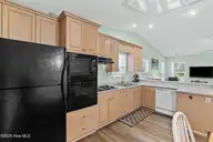 316 NE 52nd Street, Oak Island, NC 28465 — 3-bedroom home in Tranquil Harbor, Oak Island, NC, photo 18 of 49: 17_kitchen