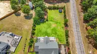100 Amelia Drive, Carthage, NC 28327 — 6-bedroom home in Ravensbrook, Carthage, NC, photo 5 of 64: 25-dji_fly_20260612_152022_0935_17812987