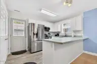 220 NE 33rd Street, Oak Island, NC 28465 — 2-bedroom home in Tranquil Harbor, Oak Island, NC, photo 8 of 39