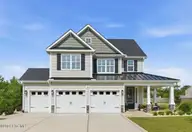 24 W Abaco Way, Hampstead, NC 28443 — 4-bedroom home in Sanctuary at Forest Sound, Hampstead, NC, photo 1 of 63: 24 W Abaco Way