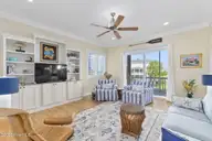 516 Blue Heron Drive, Newport, NC 28570 — 3-bedroom waterfront home in Blue Heron Bay, Newport, NC, photo 13 of 62: Living room with screened porch access