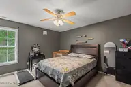 136 Constitution Avenue, Jacksonville, NC 28540 — 3-bedroom home in Liberty Hills, Jacksonville, NC, photo 13 of 28: Primary Bedroom