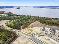 601 Caisson Run, Wilmington, NC 28412 — 4-bedroom home in Riverlights, Wilmington, NC, photo 2 of 30: Lot 571 looking Southwest