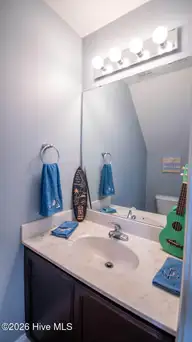 124 Waterford Way, Maysville, NC 28555 — 3-bedroom home in Waterford Ridge, Maysville, NC, photo 21 of 48: Main level half bath