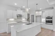 1058 Crosby Circle SW 58, Sunset Beach, NC 28468 — 3-bedroom home in Ocean Ridge Plantation, Sunset Beach, NC, photo 23 of 44: 14_kitchen