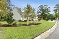 1748 Oakbrook Drive SW, Ocean Isle Beach, NC 28469 — 4-bedroom home in Brick Landing, Ocean Isle Beach, NC, photo 2 of 77: Wonderful Landscaping