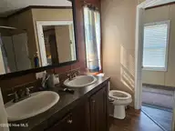 1135 Stone Chimney Road SW, Supply, NC 28462 — 3-bedroom manufactured home in Edgarwood, Supply, NC, photo 15 of 28