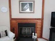 111 Forecastle Court, Washington, NC 27889 — 3-bedroom waterfront townhome in Pamlico Plantation, Washington, NC, photo 10 of 34: View of Wood Burning Fireplace