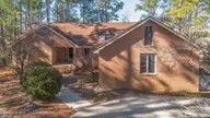 1461 S Shore Drive, Southport, NC 28461 — 3-bedroom waterfront home, Southport, NC, photo 1 of 75: front of house