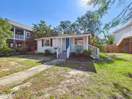 214 NE 64th Street, Oak Island, NC 28465 — 3-bedroom home in Tranquil Harbor, Oak Island, NC, photo 1 of 46