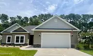 676 Boundary Loop Road NW, Calabash, NC 28467 — 3-bedroom home in Carolina Shores North, Calabash, NC, photo 1 of 46