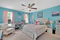 129 NE 13th Street, Oak Island, NC 28465 — 3-bedroom home, Oak Island, NC, photo 21 of 68: Master Bedroom