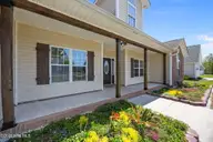 200 E Howard Drive, Jacksonville, NC 28540 — 4-bedroom home in River Bluff, Jacksonville, NC, photo 7 of 55: Front porch 2