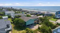 1308 Ocean Drive, Emerald Isle, NC 28594 — 4-bedroom waterfront home in Emerald Isle By The Sea, Emerald Isle, NC, photo 3 of 51: 51-web-or-mls-DJI_20260825112334_0877_D-