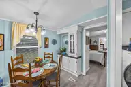 721 Blue Sail Drive SE, Bolivia, NC 28422 — 2-bedroom manufactured home in River Run Plantation, Bolivia, NC, photo 20 of 59: 19_dining area
