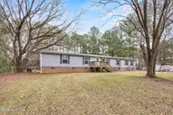 1221 Arvida Spur Road, Rocky Point, NC 28457 — 4-bedroom manufactured home in Arvida Lands, Rocky Point, NC, photo 3 of 44: 3_front exterior