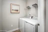 1260 Black Wolf Run, Sunset Beach, NC 28468 — 3-bedroom home in Gulls Landing, Sunset Beach, NC, photo 6 of 19: Laundry