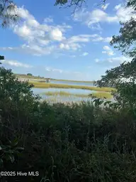 1139 Indigo Circle, Sunset Beach, NC 28468 — waterfront lot in Seaside Station, Sunset Beach, NC, photo 4 of 7