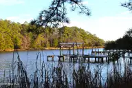 145 Heron Drive, Havelock, NC 28532 — waterfront lot in Godfreys Creek Estates, Havelock, NC, photo 3 of 19: Neighbor's Dock