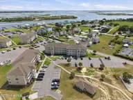 650 Cedar Point Boulevard C21, Cedar Point, NC 28584 — 2-bedroom waterfront condo in Cedar Point Villas, Cedar Point, NC, photo 1 of 30: 15-web-or-mls-DJI_20260715152556_0205_D