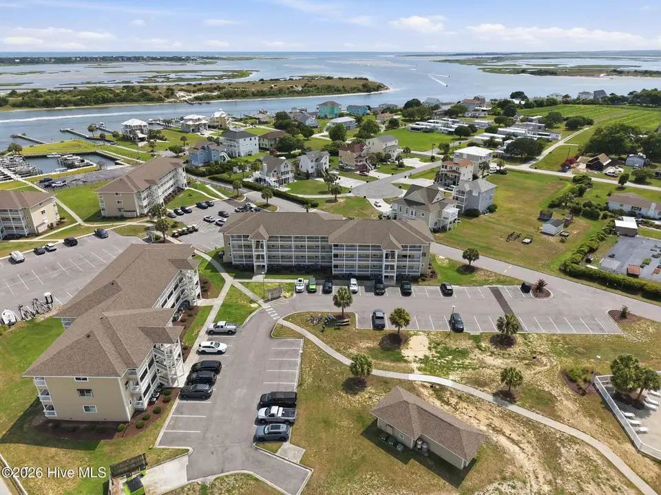 650 Cedar Point Boulevard C21, Cedar Point, NC 28584 — 2-bedroom waterfront condo in Cedar Point Villas, Cedar Point, NC, photo 1 of 30: 15-web-or-mls-DJI_20260715152556_0205_D