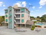 112 Oakleaf Drive 1003-A, Pine Knoll Shores, NC 28512 — 2-bedroom waterfront condo in Shutters OS, Pine Knoll Shores, NC, photo 1 of 58: Shutter on the Sound Building A