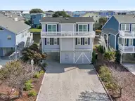 415 Sailfish Street, Sunset Beach, NC 28468 — 4-bedroom waterfront home in Sunset Beach, Sunset Beach, NC, photo 2 of 63: 415 Sailfish