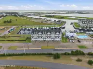 200 Olde Towne Yacht Club Drive 50, Beaufort, NC 28516 — 4-bedroom waterfront townhome in Inlet Cove Townhomes, Beaufort, NC, photo 12 of 53: 11-web-or-mls-DJI_20260707103348_0013_D
