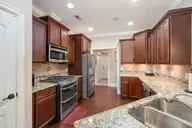 2314 Hickory Bottom Court NE, Leland, NC 28451 — 4-bedroom home in Compass Pointe, Leland, NC, photo 7 of 47: Stainless Steel Appliances