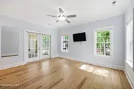 3500 Denim Court, New Bern, NC 28562 — 3-bedroom home in Carolina Colours, New Bern, NC, photo 21 of 62: Primary Bedroom with access to sunroom