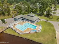506 Pamlico River Drive, Washington, NC 27889 — 3-bedroom waterfront home in Pamlico Plantation, Washington, NC, photo 17 of 24: Salt Wataer Pool & Club House