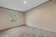 3080 Cross Street SW, Shallotte, NC 28470 — 3-bedroom manufactured home in Shell Point, Shallotte, NC, photo 20 of 35: Front Guest Bedroom