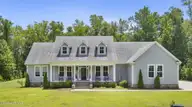 2703 E Fairway Road, Morehead City, NC 28557 — 3-bedroom home in Country Club East, Morehead City, NC, photo 1 of 71: 14-web-or-mls-2703-E-Fairway-DRONE-6-29-