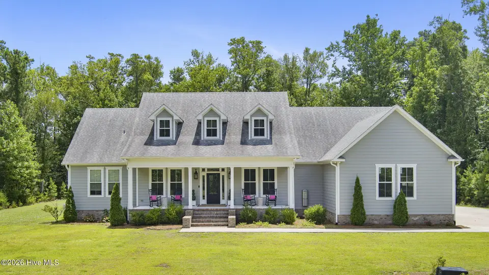 2703 E Fairway Road, Morehead City, NC 28557 — 3-bedroom home in Country Club East, Morehead City, NC, photo 1 of 71: 14-web-or-mls-2703-E-Fairway-DRONE-6-29-