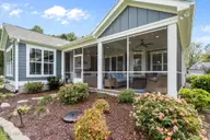 222 Twining Rose Lane, Holly Ridge, NC 28445 — 4-bedroom waterfront home in Summerhouse On Everett Bay, Holly Ridge, NC, photo 23 of 62: Screened In Porch