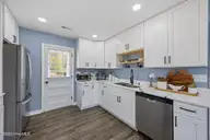 2406 N Hills Drive, New Bern, NC 28562 — 3-bedroom home, New Bern, NC, photo 14 of 62: Door to Deck and Pool Area