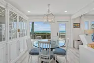 7803 Ocean Drive East, Emerald Isle, NC 28594 — 4-bedroom waterfront townhome, Emerald Isle, NC, photo 18 of 62: 7803_E_Ocean_Drive_#E_012_Dining_Room