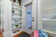 237 Sea Dreams Drive, Atlantic Beach, NC 28512 — 2-bedroom waterfront home in Sea Dreams, Atlantic Beach, NC, photo 21 of 71: Side Door Porch Entrance view