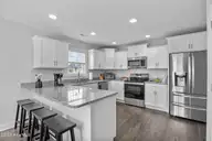 806 Calebs Creek Court, Maysville, NC 28555 — 3-bedroom home in Village Creek, Maysville, NC, photo 14 of 37: 27_kitchen