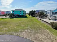 1064 8 Tide Ridge Drive, Holden Beach, NC 28462 — waterfront lot in Pointe West, Holden Beach, NC, photo 2 of 42: 1064TideRidgeLot8 - 2