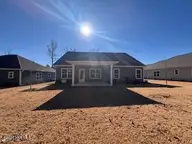 114 Firethorn Circle, Wallace, NC 28466 — 4-bedroom home in River Landing, Wallace, NC, photo 17 of 50: Back view of Home