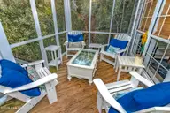 23 Ibis Roost, Bald Head Island, NC 28461 — 3-bedroom home in Ibis Roost, Bald Head Island, NC, photo 23 of 40: Screened in Porch