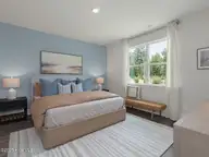 3044 Bottlebrush Drive Unit 2081, Leland, NC 28451 — 3-bedroom townhome in Indigo Preserve, Leland, NC, photo 15 of 44: Primary Bedroom